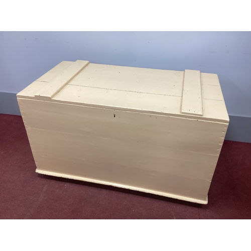 1544 - A XIX Century Painted Pine Blanket Box, with hinged lid on castors, 114cm wide.