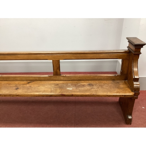 1578 - A XIX Century Pitch Pine Pew, with open back and shaped end supports, 295cm wide.