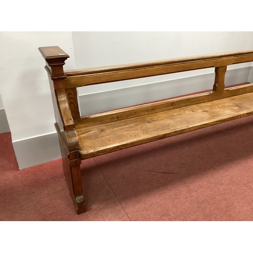 1578 - A XIX Century Pitch Pine Pew, with open back and shaped end supports, 295cm wide.
