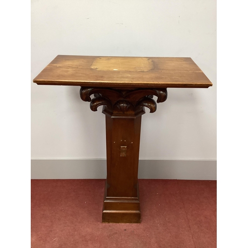 1583 - An Oak and Mahogany Pedestal, the pine top with scroll carved decoration, chamfered sides and plinth... 