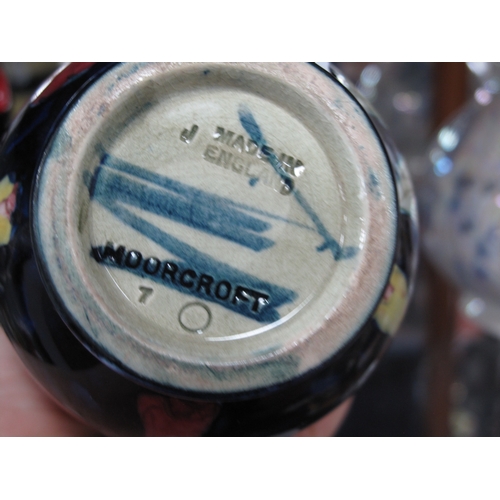 1249 - Moorcroft vase decorated in the Pansy pattern with impressed marks to base, approx 12cm high