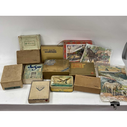 1078 - Jigsaw Puzzles, to include wooden victory Flying Scotsman, Chad Valley, approximately fifteen, compl... 