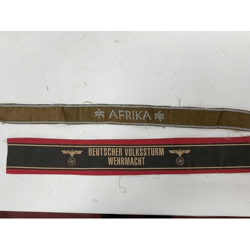 1300 - Collectables, reproduction German Armed Forces Insignia, including Demjansk Campaign shield and belt... 