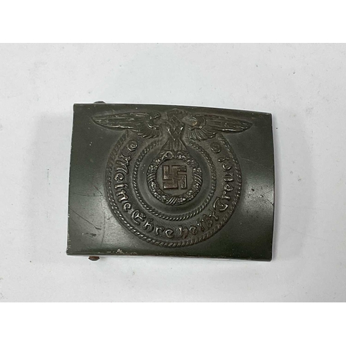 1300 - Collectables, reproduction German Armed Forces Insignia, including Demjansk Campaign shield and belt... 