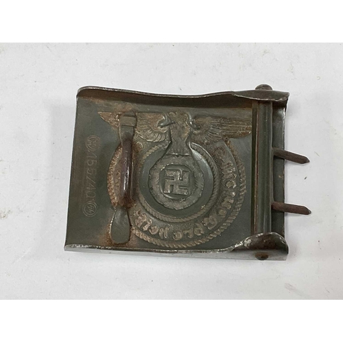 1300 - Collectables, reproduction German Armed Forces Insignia, including Demjansk Campaign shield and belt... 