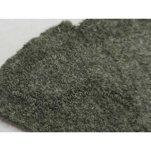 1300 - Collectables, reproduction German Armed Forces Insignia, including Demjansk Campaign shield and belt... 