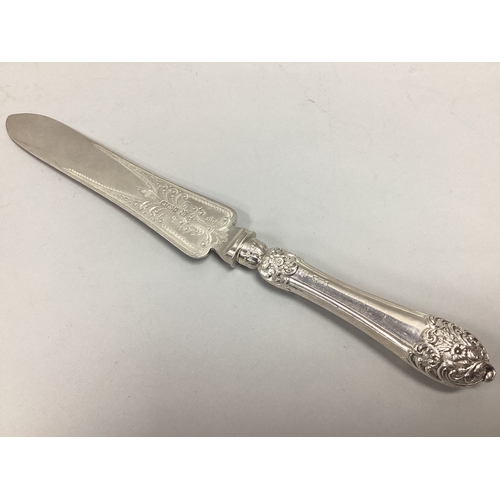 36 - A Decorative Edwardian Hallmarked Silver Dessert Serving Knife, JDWD, Sheffield 1901, the shaped bla... 