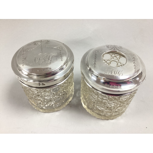 61 - A Hallmarked Silver Mounted Dressing Table Jar, W.D, Birmingham 1910, the detachable lid with decora... 