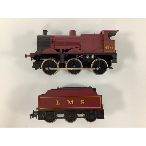 A Lima 0 gauge LMS 0-6-0 4F locomotive and tender in LMS red, untested ...