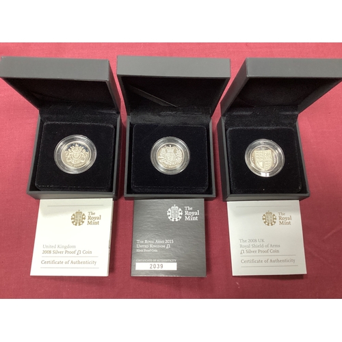 31 - Three Royal Mint UK Silver Proof £1 Coins, includes two 2008 and a 2015, all cased with certificates... 