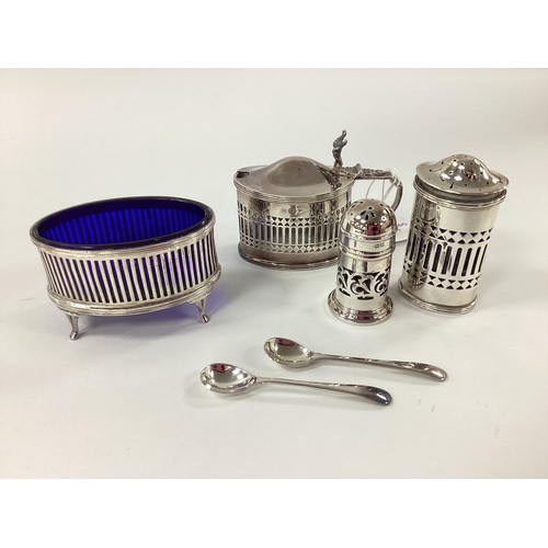 2 - A Hallmarked Silver Salt, Birmingham 1912, of oval pierced form, raised on four pad feet, with blue ... 