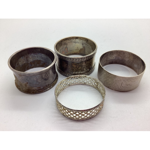 24 - A Hallmarked Silver Napkin Ring, with decorative edge, monogrammed, together with two further hallma... 