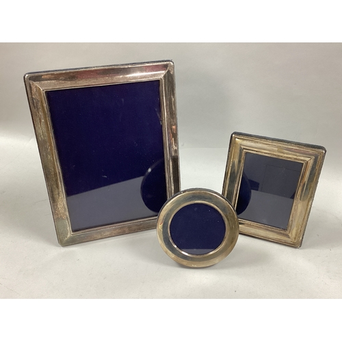 28 - Carr's; A Hallmarked Silver Mounted Rectangular Photograph Frame, of plain design, on a blue plush e... 