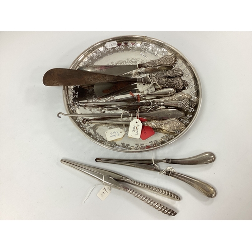 42 - A Collection of Assorted Hallmarked Silver Handled Button Hooks, (various makers and dates) two pair... 