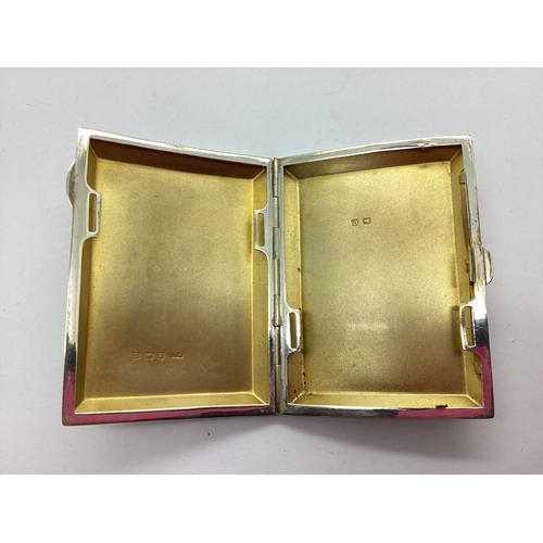 47 - A Hallmarked Silver Cigarette Case, HL Brown, Birmingham 1927, of rectangular form, allover engine t... 