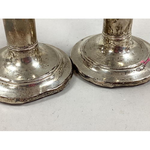 5 - A Pair of Hallmarked Silver Candlesticks, Ellis & Co, Birmingham 1907, each of plain form with reede... 