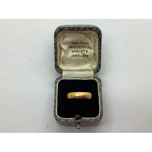 58 - A 22ct Gold Plain Wedding Band (finger size M).