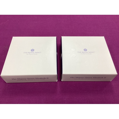132 - Two Royal Mint 2022 UK Silver Proof 50p Coins, both commemorating QEII, both cased with certificates... 