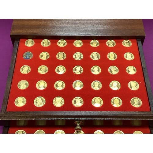 200 - Danbury Mint 'Our Royal Sovereigns' Sterling Silver Gilt Seventy Medal Collection, features a comple... 