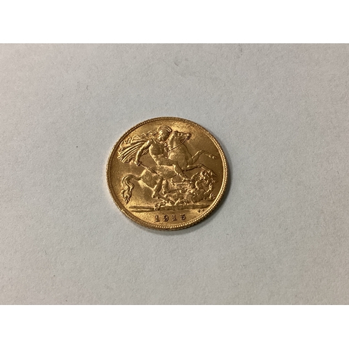 214 - 1915 George V Gold Half Sovereign, together with an 1883 USA silver 'Morgan Dollar', 1966 Spain 100 ... 