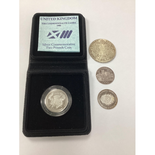 65 - 1986 Royal Mint UK XIII Commonwealth Games Silver £2 Coin, together with a 1780 Maria Theresia silve... 