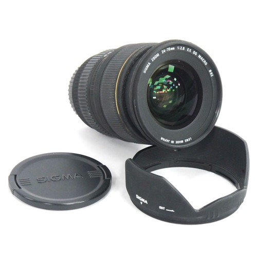 1309 - Camera Lens; Sigma zoom 24-70mm f/2.8 EX DG macro, with front and back lens caps and lens hood, stor... 