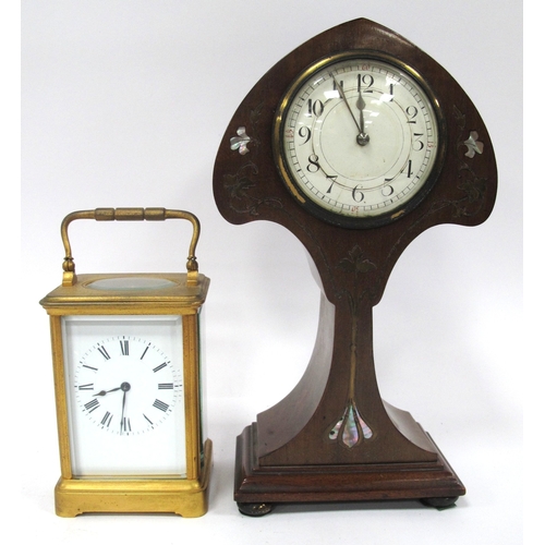 1344 - An Art Nouveau Mahogany Cased Mantle Clock, with brass and mother of pearl inlay, the white enamel d... 