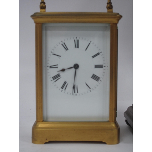 1344 - An Art Nouveau Mahogany Cased Mantle Clock, with brass and mother of pearl inlay, the white enamel d... 