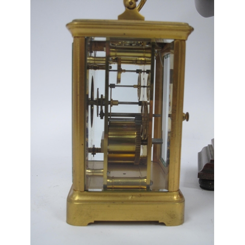 1344 - An Art Nouveau Mahogany Cased Mantle Clock, with brass and mother of pearl inlay, the white enamel d... 