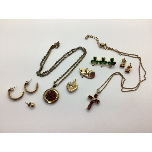 180 - A Dainty 9ct Gold Heart Shape Bi-Colour Locket, with applied floral decoration to the front, inscrib... 