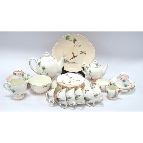 1305 - Royal Doulton 'The Coppice' Table Ware V2105, of approximately thirty-two pieces, including two diff... 