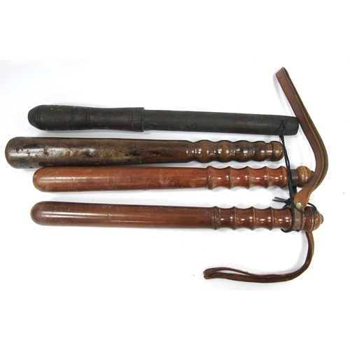 1434 - Truncheons - Three turned hardwood examples, a primitive example crudely named C.B. Pedersen 4 mast ... 