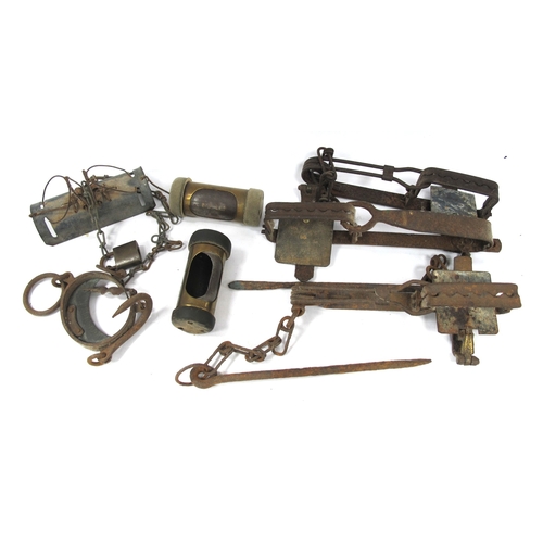1513 - Gamekeeper's Wrought Iron Animal Traps (x 4), including Jefco, C. Homes, scales, pneumatic money cyl... 