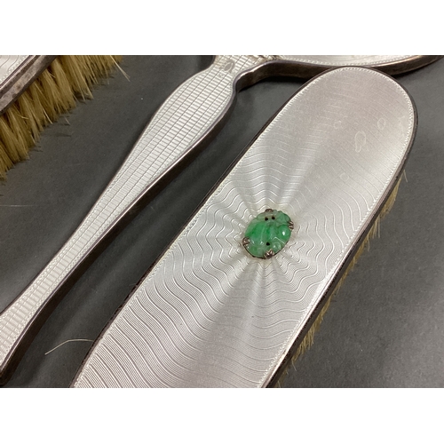 276 - A Matched Hallmarked Silver and Enamel Five Piece Dressing Table Set, Birmingham 1938, 1939, each wi... 