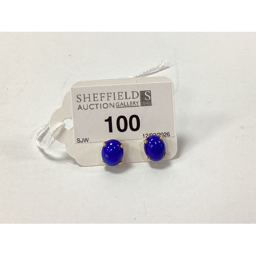 100 - A Pair of Lapis Lazuli Single Stone Earrings, each oval cabochon four claw set, butterfly backs stam... 