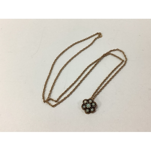 104 - An Edwardian Style Opal Set Cluster Pendant, suspended on long fancy link chain, stamped 