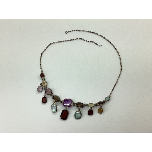 119 - A Vintage Multi Gem Set Drop Necklace, spectacle set to fine chain (incomplete / lacking clasp).