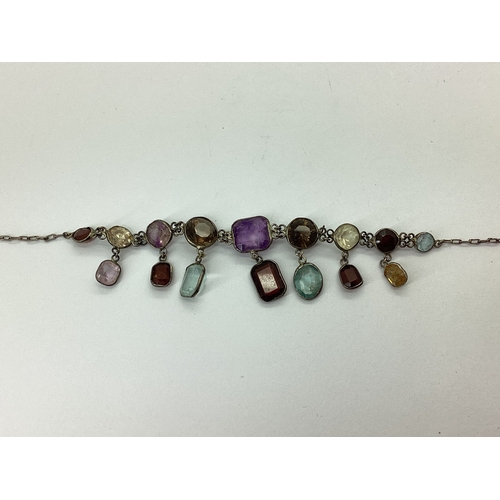 119 - A Vintage Multi Gem Set Drop Necklace, spectacle set to fine chain (incomplete / lacking clasp).