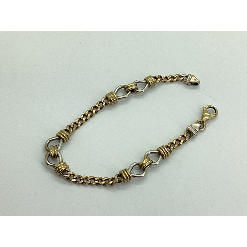 139 - A 9ct Gold Fancy Link Bracelet, the decorative white gold links between yellow gold curb link connec... 