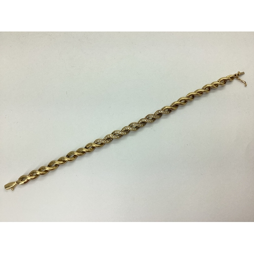 144 - A Fancy Twist Style Bracelet, with inset highlights, to snap clasp, stamped 