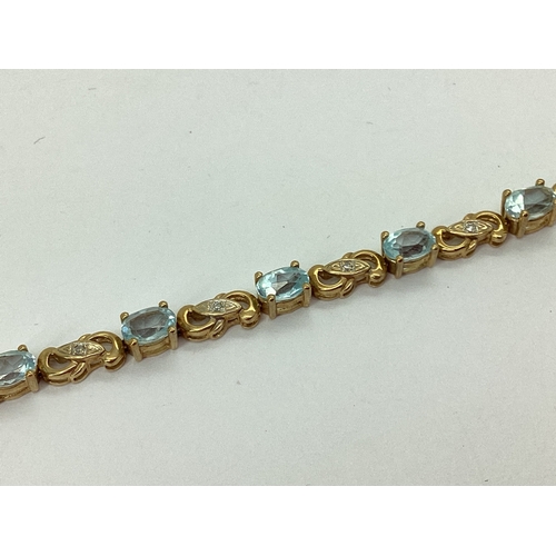 148 - A Modern Stone Set Panel Style Bracelet, oval claw set between inset highlights, to snap clasp. stam... 