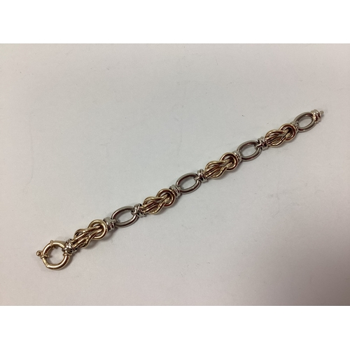 162 - A 9ct Gold Two Colour Gold Hollow Fancy Link Bracelet, to large bolt ring clasp, 18cm long (15.5gram... 