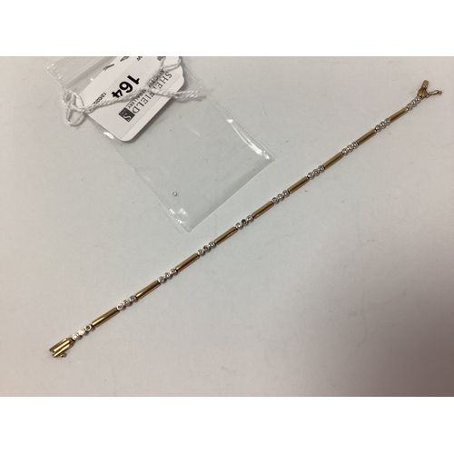 164 - A Fancy Diamond Set Panel Style Bracelet, alternate rubover set, to snap clasp, 18.5cm long, stamped... 