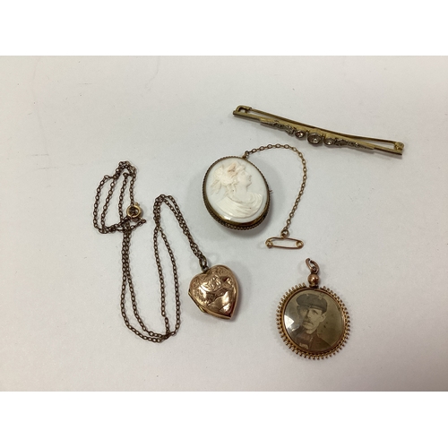 167 - An Antique Circular Glazed Locket Style Pendant, within decorative textured surround, stamped 