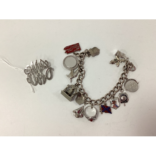 178 - A Curb Link Charm Bracelet, suspending numerous novelty charm pendants including 'England' enamel sh... 