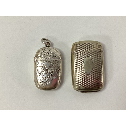 19 - A Hallmarked Silver Vesta Case, with allover foliate style decoration, Birmingham 1886, measuring ap... 