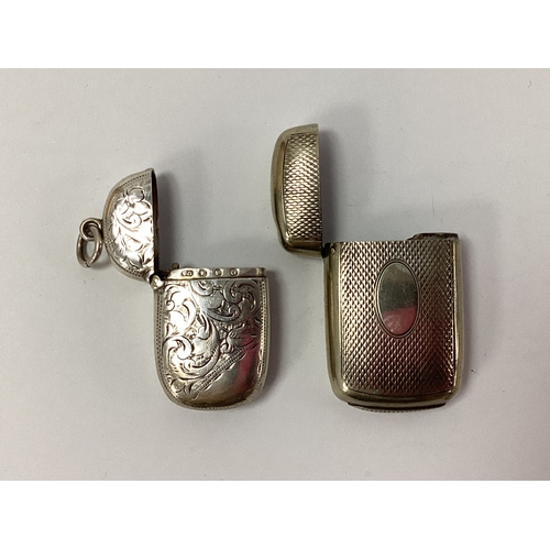 19 - A Hallmarked Silver Vesta Case, with allover foliate style decoration, Birmingham 1886, measuring ap... 