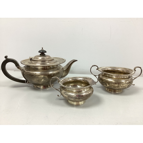 2 - A Hallmarked Silver Three Piece Tea Set, Goldsmiths & Silversmiths Co, London 1927, each of plain ci... 