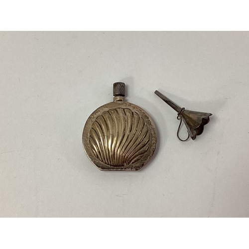 21 - A Dainty Hallmarked Silver Scent Flask, textured to the front, complete with a funnel.