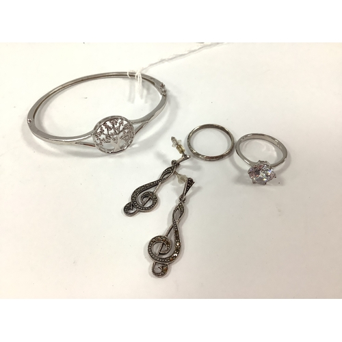 217 - A Modern 925 Tree of Life Design CZ Inset Hinged Bangle, together with a pair of treble clef design ... 